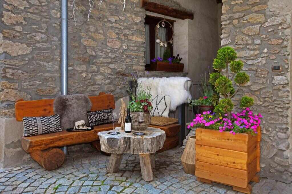 Terrace seating outside Chalet Faure