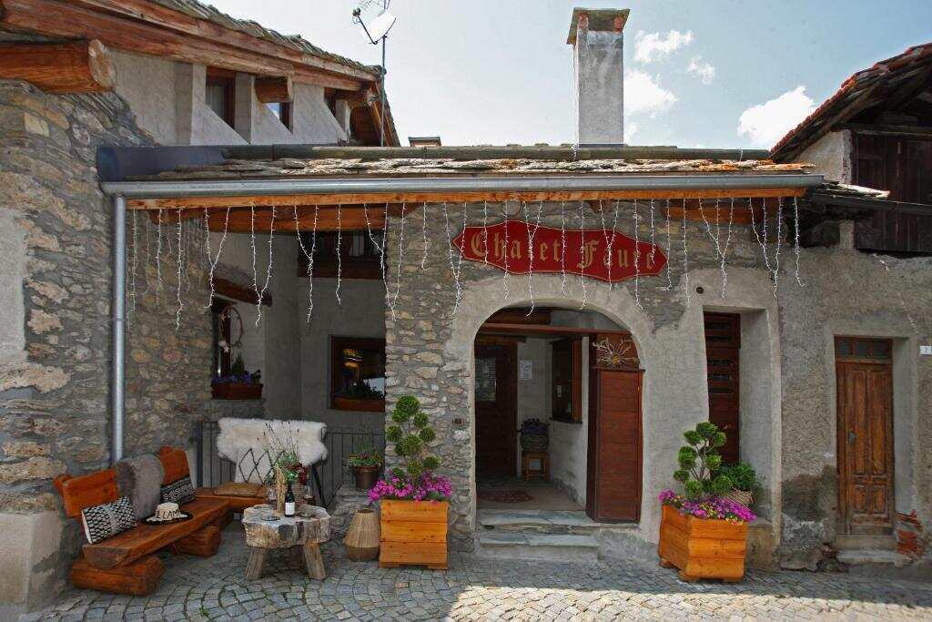 Chalet Faure stone facade and entrance in Sauze d’Oulx